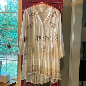 Greek influenced dress that is flowy with flog leaves and butterfly sleeves